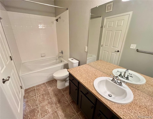 full bathroom featuring vanity, shower / bathtub combination, and toilet