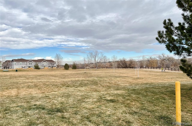 view of yard with a rural view