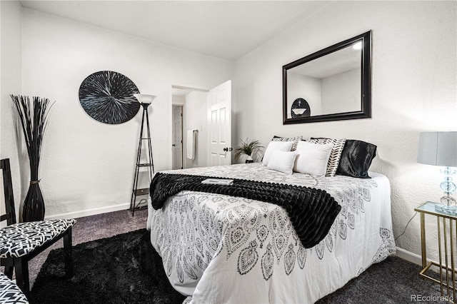 1209 E Routt Ave, Pueblo, CO 81004 - bedroom with dark colored carpet and baseboards