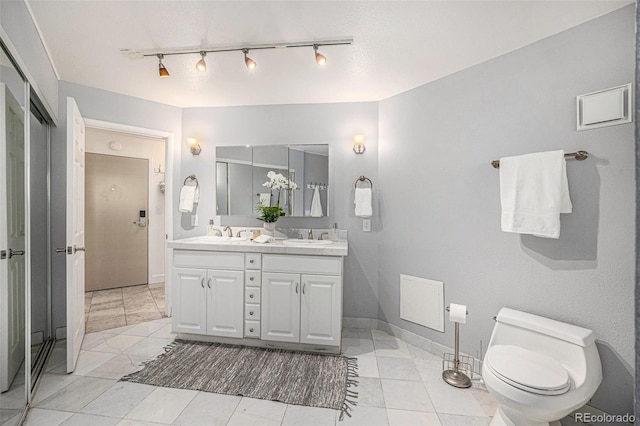 1625 Larimer St Unit 2601, Denver, CO 80202 - bathroom featuring double vanity and track lighting