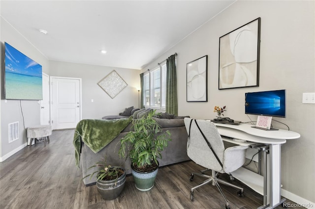 home office with wood-type flooring