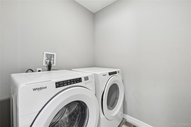 laundry room featuring washer and dryer