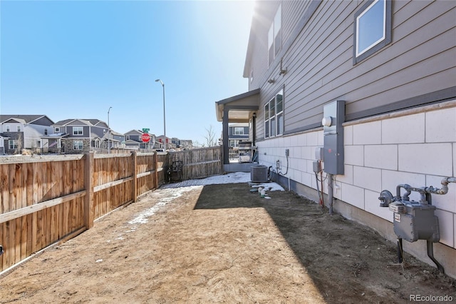 view of yard featuring central AC unit