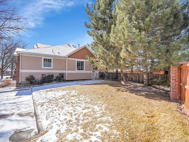 view of snow covered property