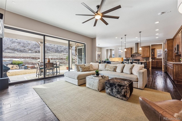 4937 Hogback Ridge Rd, Morrison, CO 80465 - living area with ceiling fan, dark wood-type flooring, visible vents, and recessed lighting