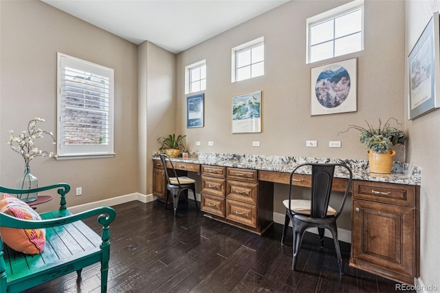4937 Hogback Ridge Rd, Morrison, CO 80465 - office with built in desk, baseboards, and dark wood-style floors