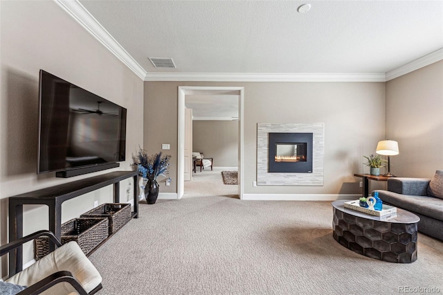 4937 Hogback Ridge Rd, Morrison, CO 80465 - carpeted living area with a glass covered fireplace, visible vents, baseboards, and ornamental molding