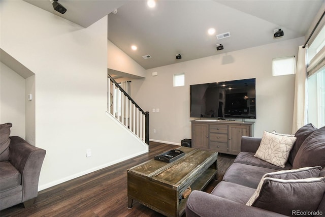 213 S Old Hammer Ct, Aurora, CO 80018 - living area featuring vaulted ceiling, dark wood-style flooring, stairway, and recessed lighting