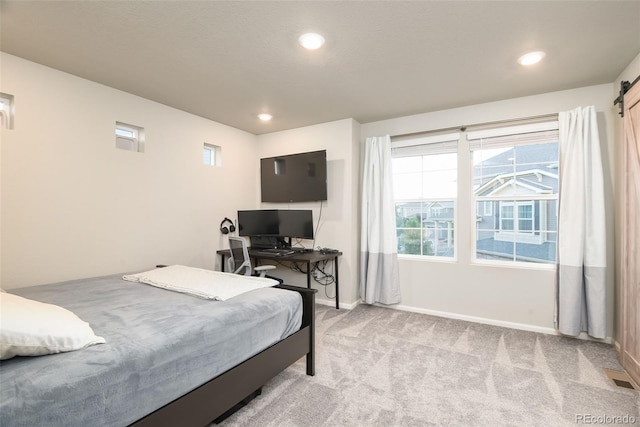 213 S Old Hammer Ct, Aurora, CO 80018 - bedroom featuring light carpet and recessed lighting