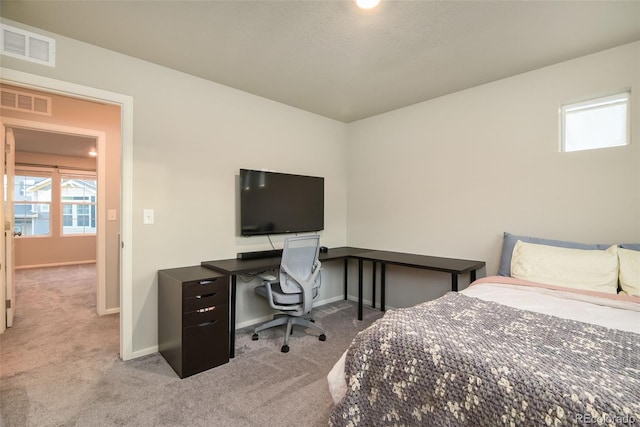 213 S Old Hammer Ct, Aurora, CO 80018 - carpeted bedroom with a desk and baseboards
