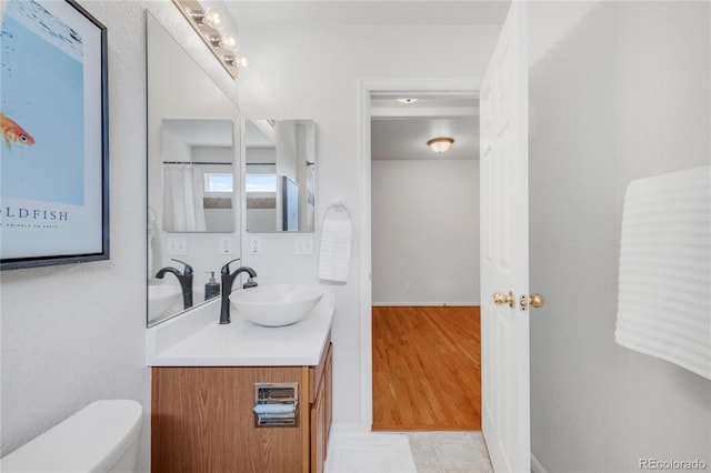 23612 E Mississippi Cir, Aurora, CO 80018 - bathroom featuring vanity and toilet