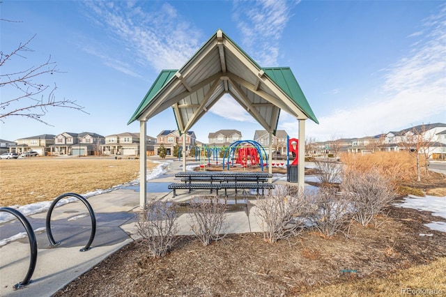 view of home's community featuring a playground