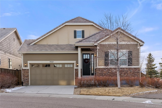 craftsman-style house featuring a garage