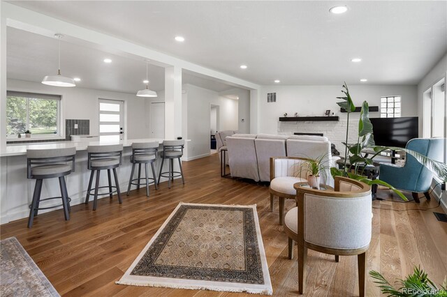 2175 S Joliet St, Aurora, CO 80014 - living area featuring wood finished floors and recessed lighting