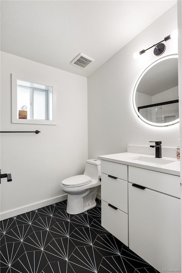 2175 S Joliet St, Aurora, CO 80014 - full bathroom with vanity and tile patterned floors