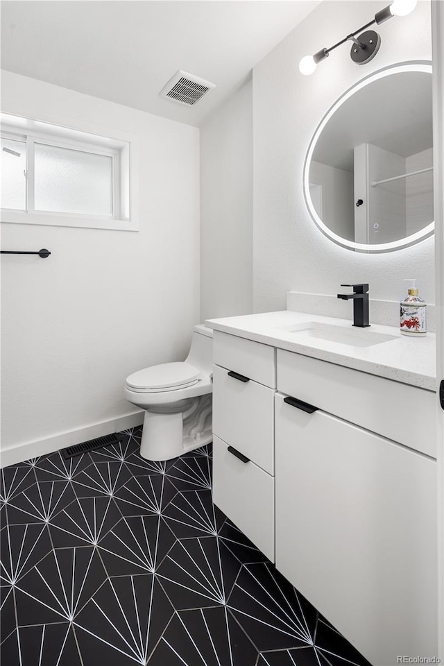 2175 S Joliet St, Aurora, CO 80014 - bathroom with vanity and toilet