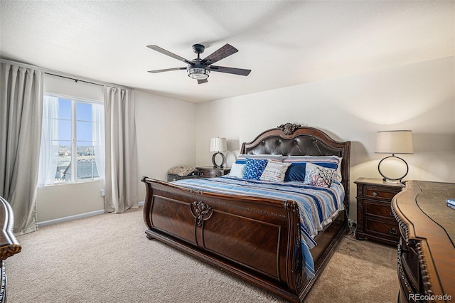 bedroom featuring baseboards, carpet, and a ceiling fan