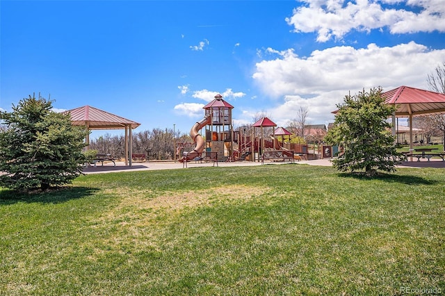 community jungle gym with a yard and a gazebo