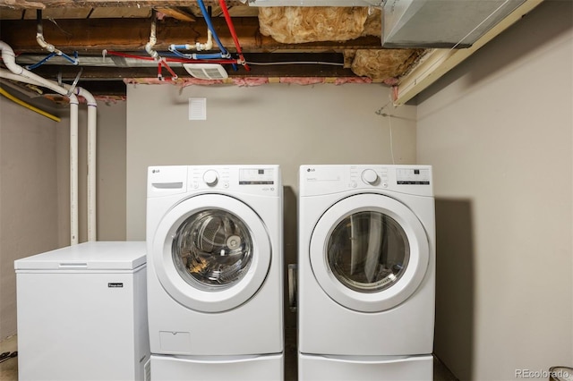 laundry area with washer and clothes dryer