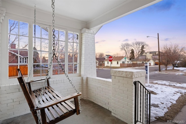 view of snow covered patio