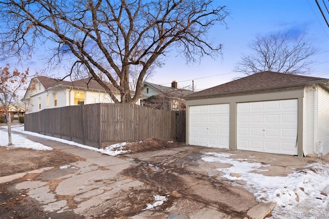 view of snow covered garage