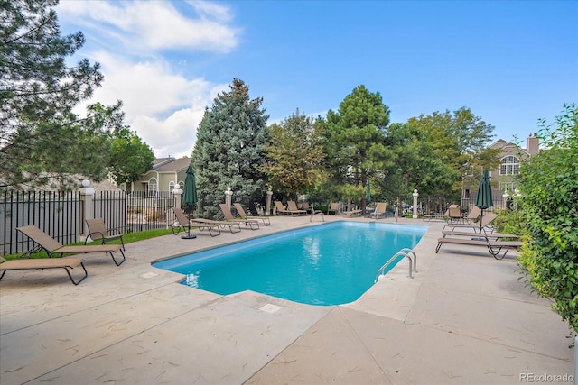 view of pool with a patio