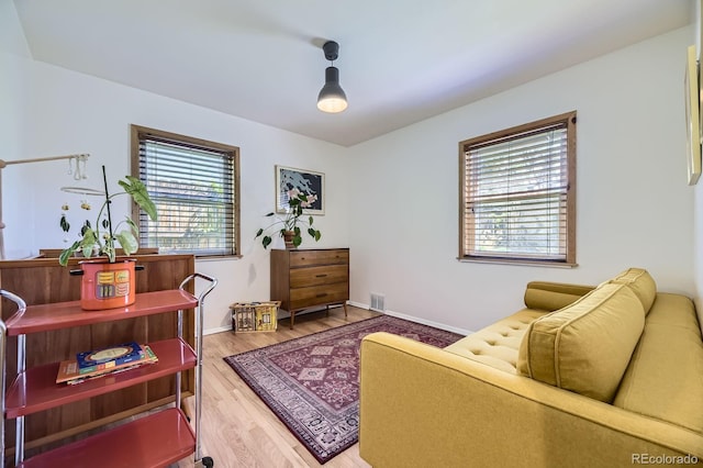 2844 Bellaire St, Denver, CO 80207 - living area featuring light wood finished floors and baseboards