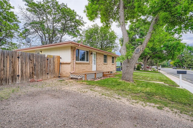 5274 Alkire St, Arvada, CO 80002 - view of side of property with brick siding
