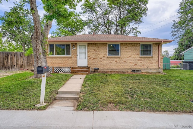 5274 Alkire St, Arvada, CO 80002 - view of front facade featuring brick siding and entry steps