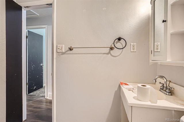 5274 Alkire St, Arvada, CO 80002 - bathroom featuring wood finished floors and vanity