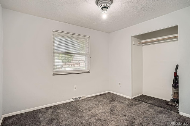 5274 Alkire St, Arvada, CO 80002 - unfurnished bedroom with a textured ceiling and carpet floors