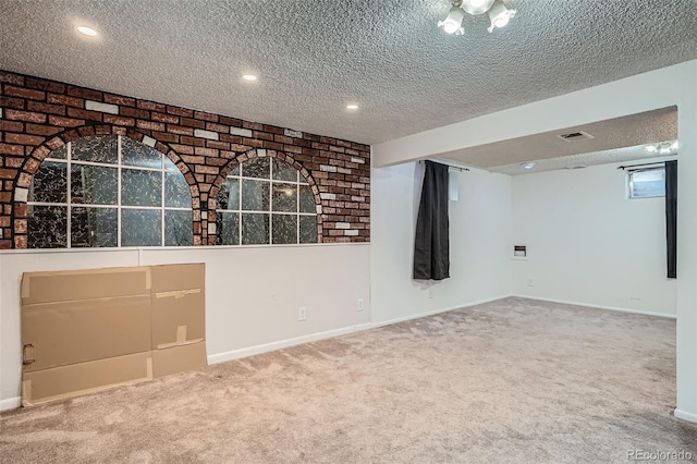 5274 Alkire St, Arvada, CO 80002 - below grade area with a textured ceiling, carpet, and recessed lighting