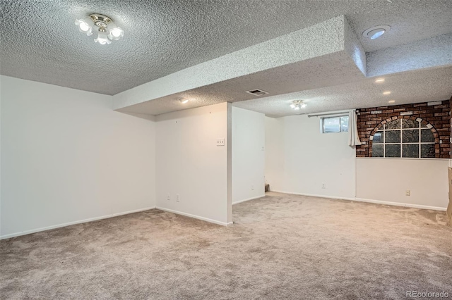 5274 Alkire St, Arvada, CO 80002 - below grade area with a textured ceiling and carpet