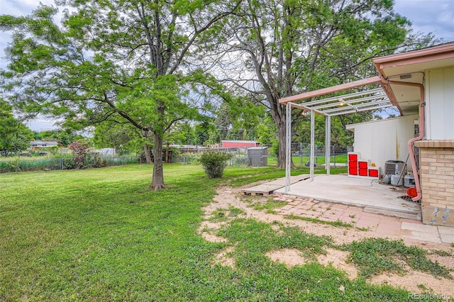 5274 Alkire St, Arvada, CO 80002 - fenced backyard featuring a patio