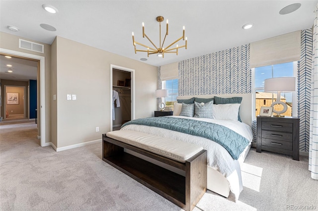 23782 E 33rd Pl, Aurora, CO 80019 - bedroom featuring carpet flooring, a chandelier, baseboards, recessed lighting, and a walk in closet