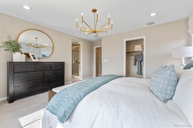 23782 E 33rd Pl, Aurora, CO 80019 - carpeted bedroom featuring a chandelier, a spacious closet, baseboards, and connected bathroom