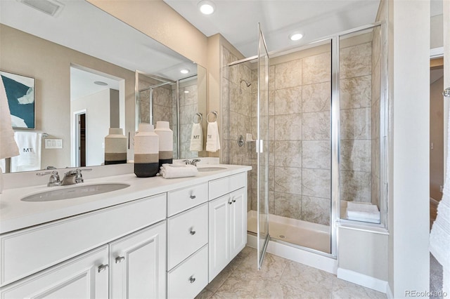 23782 E 33rd Pl, Aurora, CO 80019 - full bathroom featuring double vanity and a stall shower