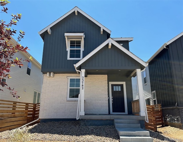 23782 E 33rd Pl, Aurora, CO 80019 - view of front facade with brick siding and covered porch