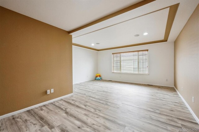 5293 Malaya St, Denver, CO 80249 - unfurnished room featuring baseboards, wood finished floors, and recessed lighting