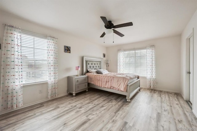 5293 Malaya St, Denver, CO 80249 - bedroom featuring baseboards, a ceiling fan, and light wood-type flooring