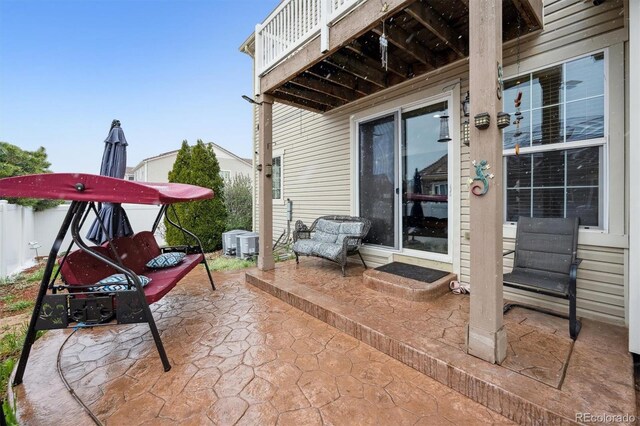 5293 Malaya St, Denver, CO 80249 - view of patio with entry steps and central air condition unit