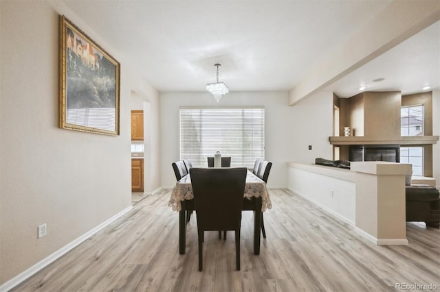 5293 Malaya St, Denver, CO 80249 - dining room with light wood-style floors and baseboards