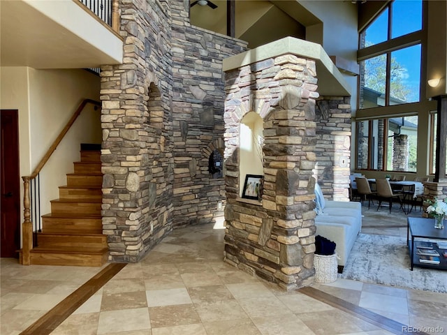 wine cellar with a high ceiling and tile flooring