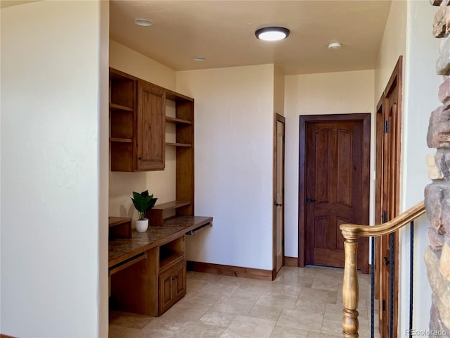 interior space featuring light tile floors