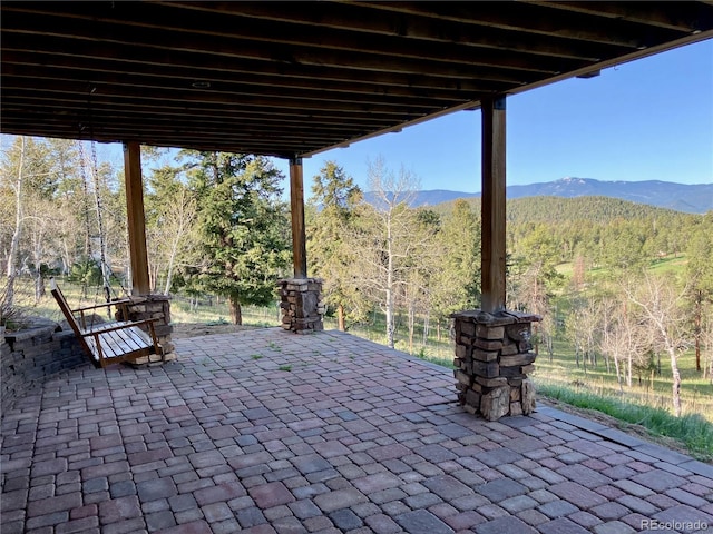 view of patio featuring a mountain view