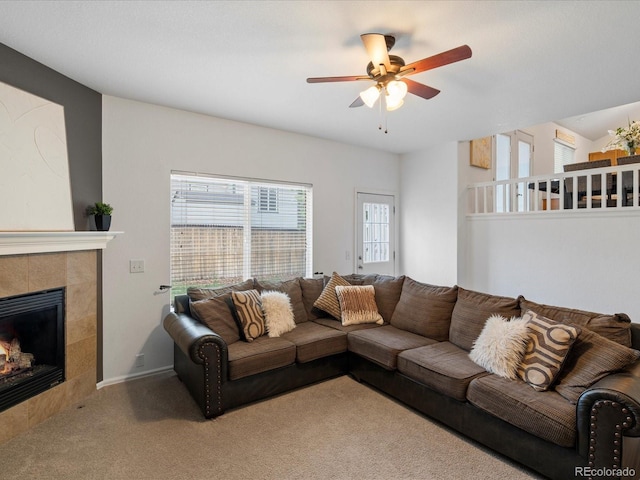 4436 Windmill Dr, Brighton, CO 80601 - living area featuring ceiling fan, carpet flooring, and a tiled fireplace