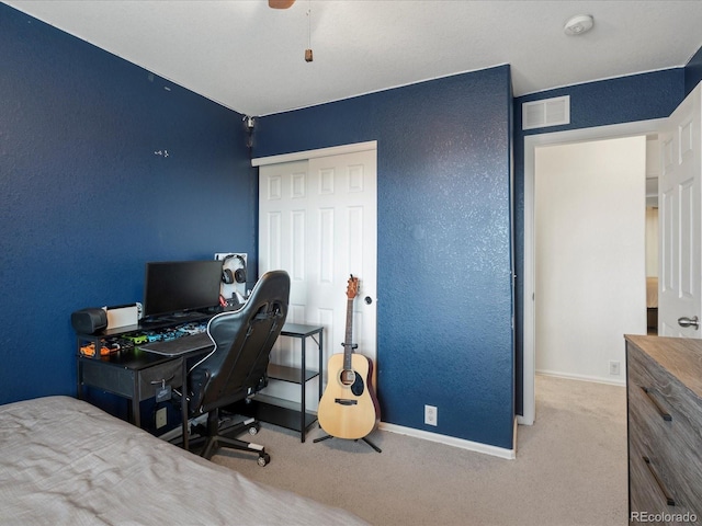 4436 Windmill Dr, Brighton, CO 80601 - bedroom with carpet, a textured wall, a closet, and ceiling fan