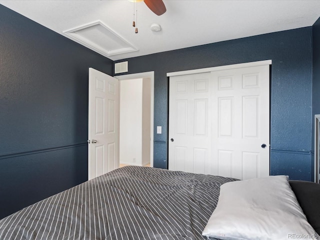 4436 Windmill Dr, Brighton, CO 80601 - bedroom with attic access, a closet, a textured wall, and ceiling fan