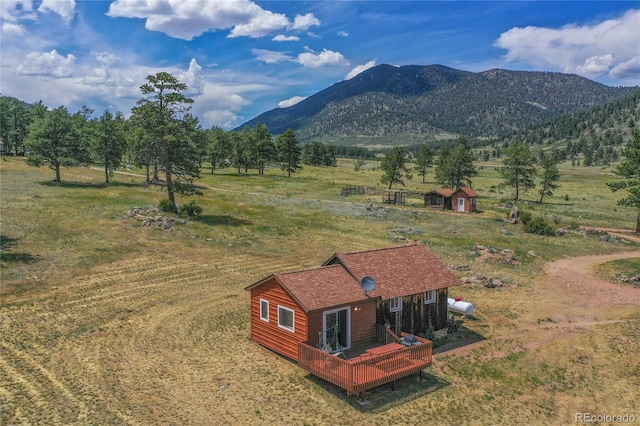 mountain view featuring a rural view