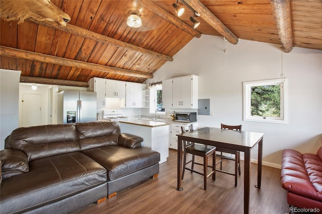 living room with high vaulted ceiling, beam ceiling, hardwood / wood-style flooring, wood ceiling, and sink